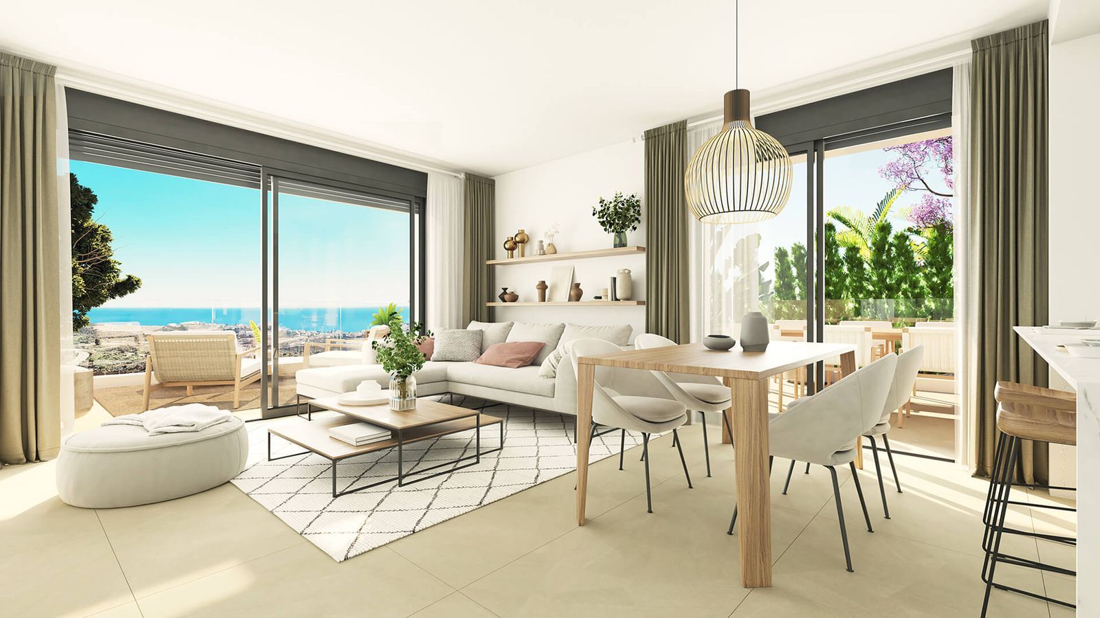 Lichte woon- en eetkamer met uitzicht op zee in Calanova Collection.